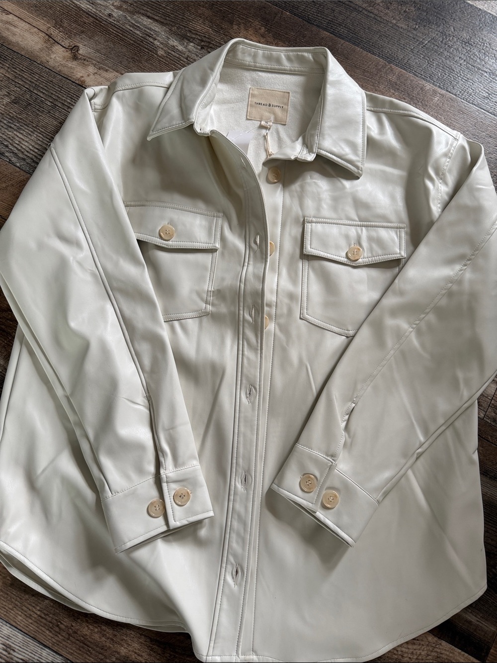 Women’s faux leather button up